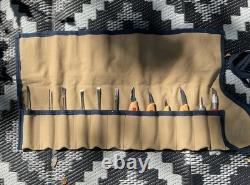 A Set Of Wood Carving Tools (Ramelson, Flexcut, 2 Misc) with canvas carrier