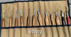 A Set Of Wood Carving Tools (Ramelson, Flexcut, 2 Misc) with canvas carrier