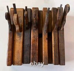 Job lot of 7 old wooden moulding planes antique woodworking tools