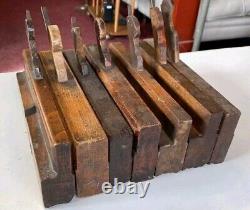 Job lot of 7 old wooden moulding planes antique woodworking tools