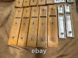 Odd set of 15 woodworking plane soles 10 wooden 5 cast aluminum most are radius