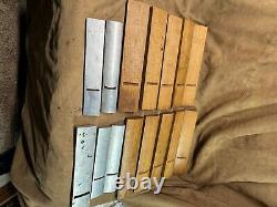 Odd set of 15 woodworking plane soles 10 wooden 5 cast aluminum most are radius